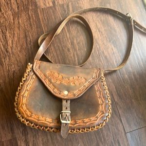 Mexican Aztec calendar on the back of bag